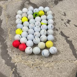 50 used golfballs