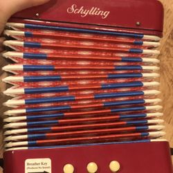 Vintage Schylling Accordion 