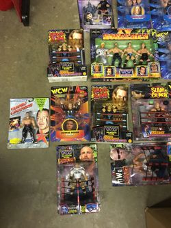 WWF WWE WCW Figures close to 70 on the card and a bunch loose!