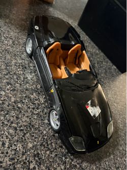 Mini ferrari black from hot wheels