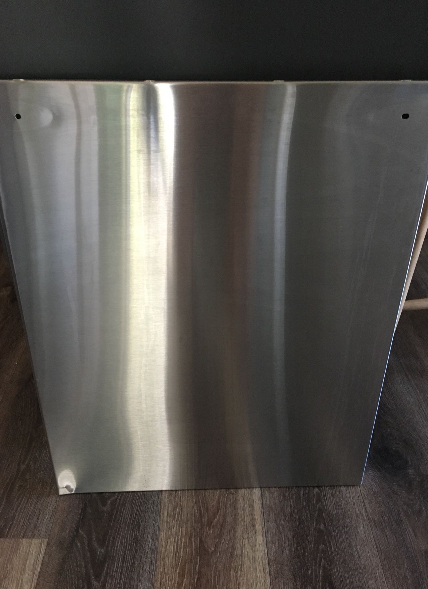 Stainless steel cover for a fridgidaire dishwasher