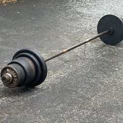 6 FOOT BARBELL BAR  & 145 LBS. OF WEIDER INTERNATIONAL OLYMPIC PLATES  (PAIRS OF ) :  22s  &  11s  & (TEN)  5.5s  &  (TEN)  2.75s