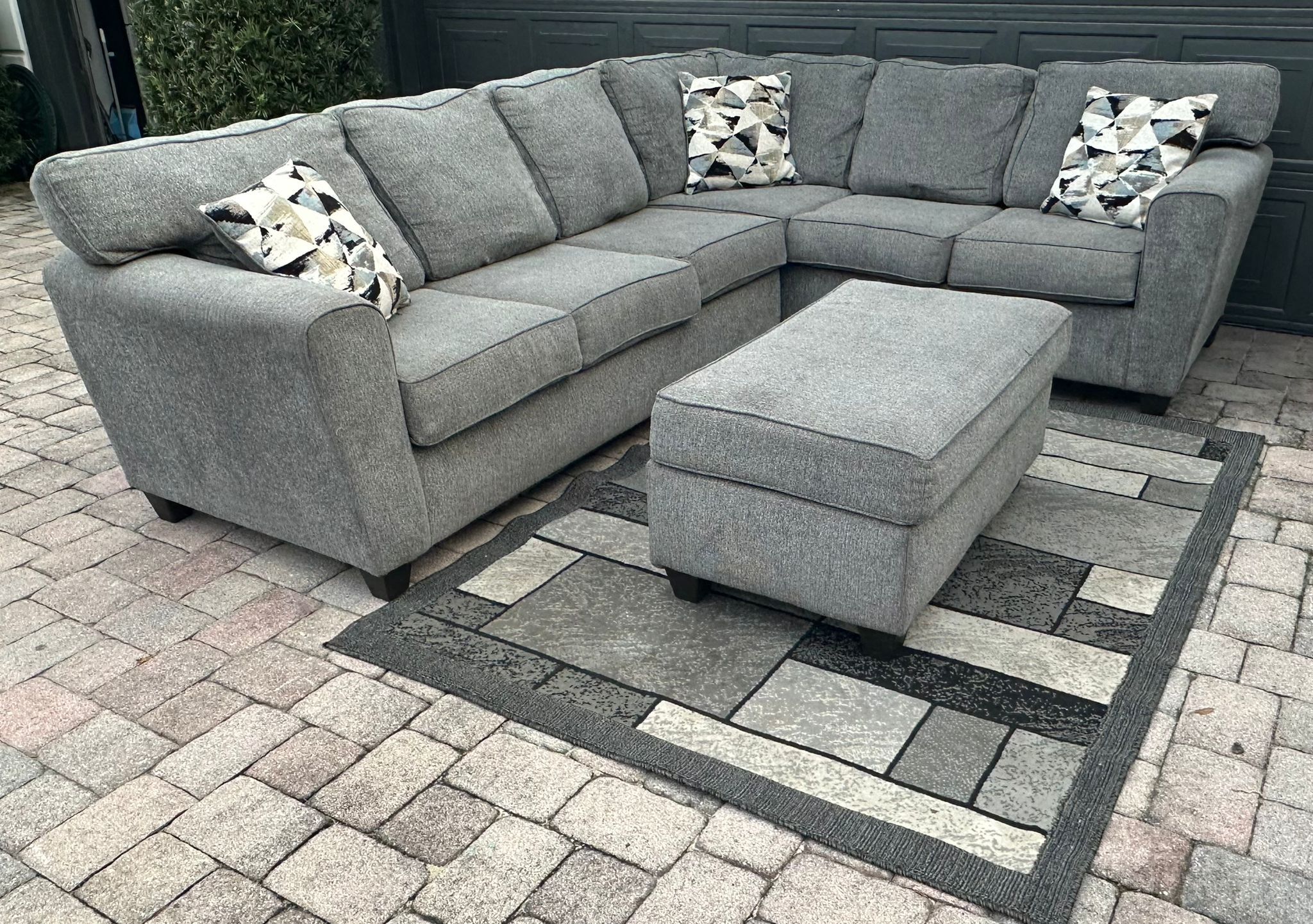 Sectional Couch Dark Grey with Pillows and Rug… Delivery Extra