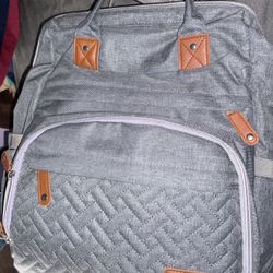 Gently used diaper bag With changing area