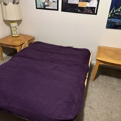 Wood futon With Purple Cover And Nightstands 