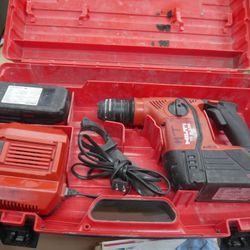 Hilti TE6-A36 hammer drill 36v ; 2 batteries CPC 36 V ; C 4/36-350 CHARGER ; HANDLE; PLASTIC CASE. USED. TESTED. IN A GOOD WORKING ORDER. 