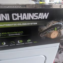 21v Mini chainsaw New In Box 