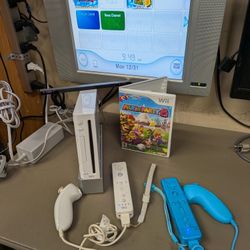 Nintendo Wii with 2 remotes/nunchucks and Mario party 8