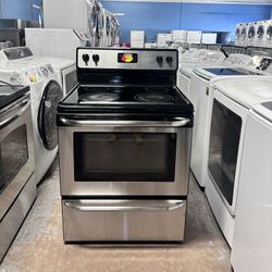 Frigidaire )Electric stove, works perfectly, is very clean, and comes with a warranty.   