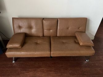 Slightly used Brown Futon