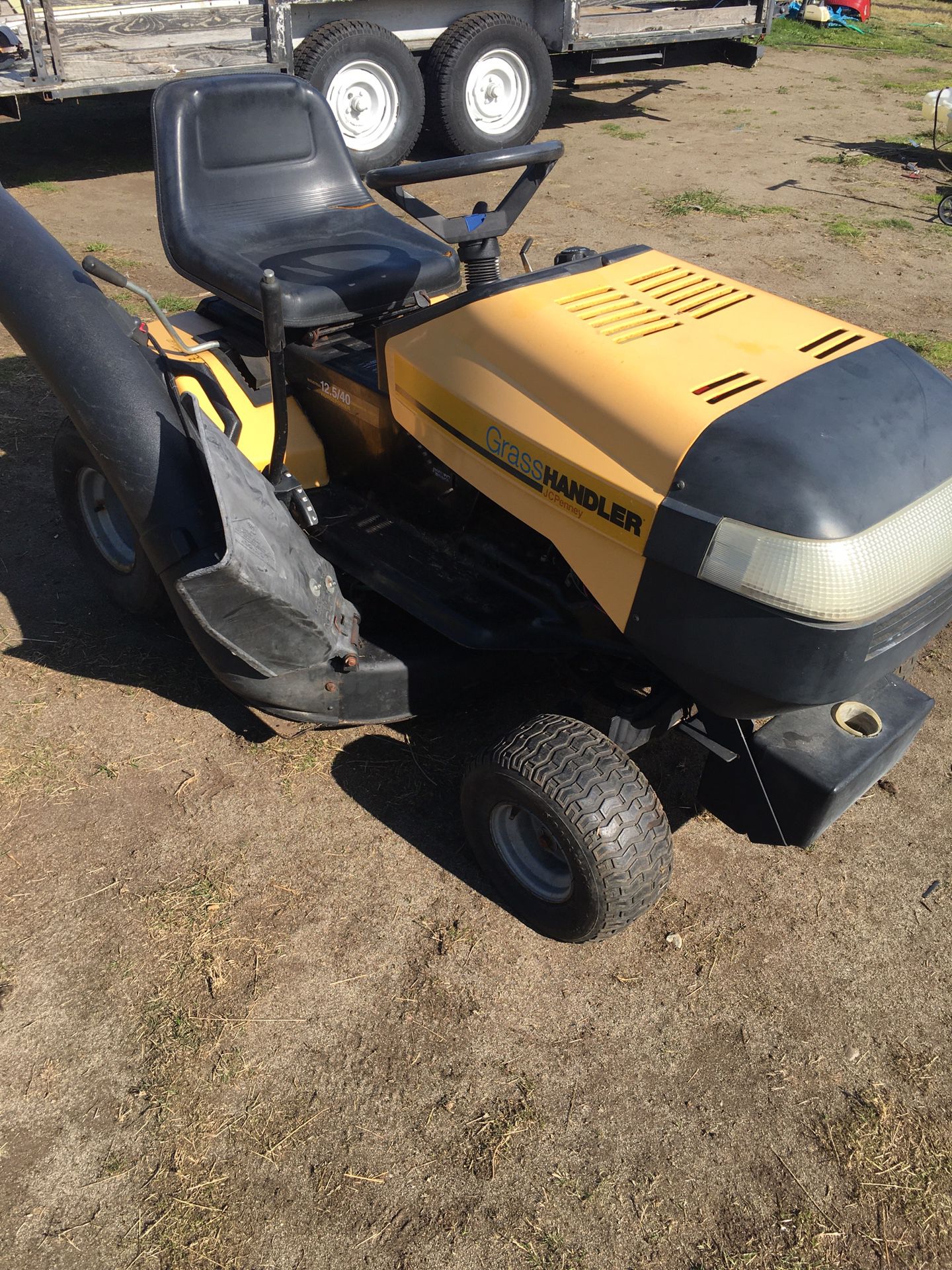 Riding lawn mower, penny’s , 12.5 Briggs-Stratton engine, six speed , easy to drive, mows nice, slow leak right front tire, half a bagger system just