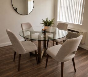 Round dining table with chairs