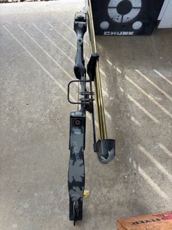 Archery target, bow & arrows