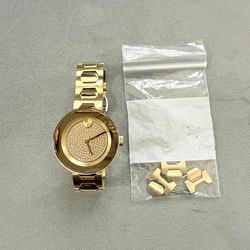 beautiful movado women watch with extra links. (MUST SELL TODAY)