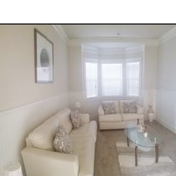 Ashley furniture Cream Leather Sofa Set With Tables Never Sat On.