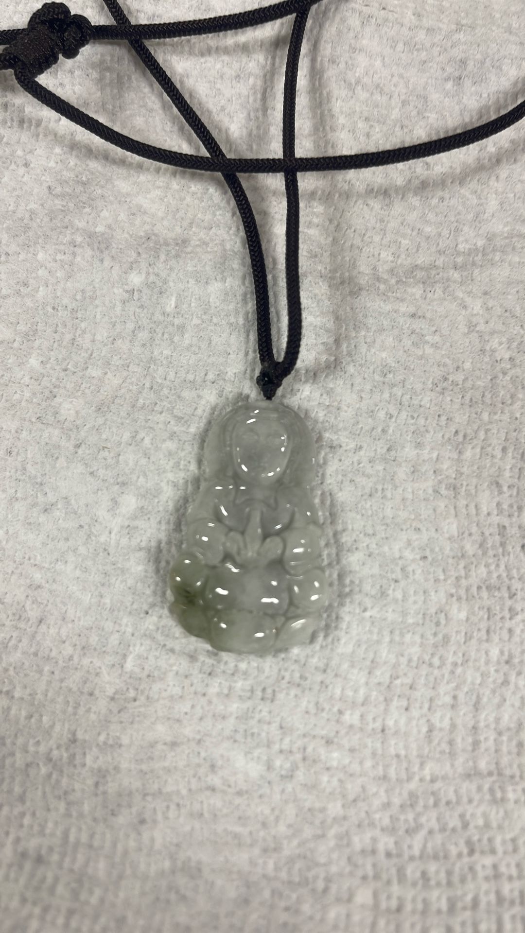real jade kwan yin necklace for good health .