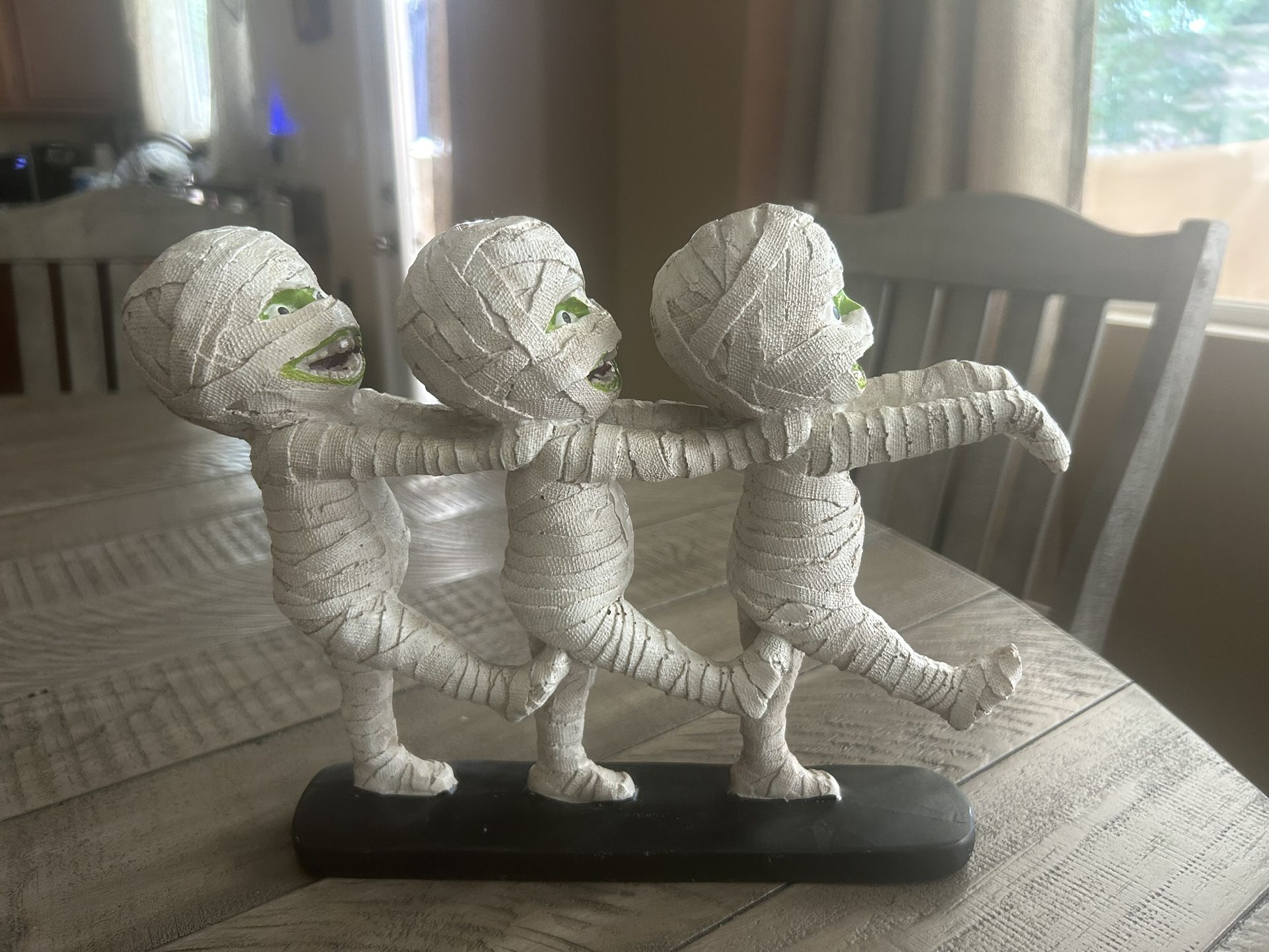 Three Mummies