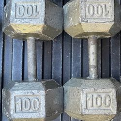 PAIR OF 100 POUND STEEL HEX DUMBBELLS 