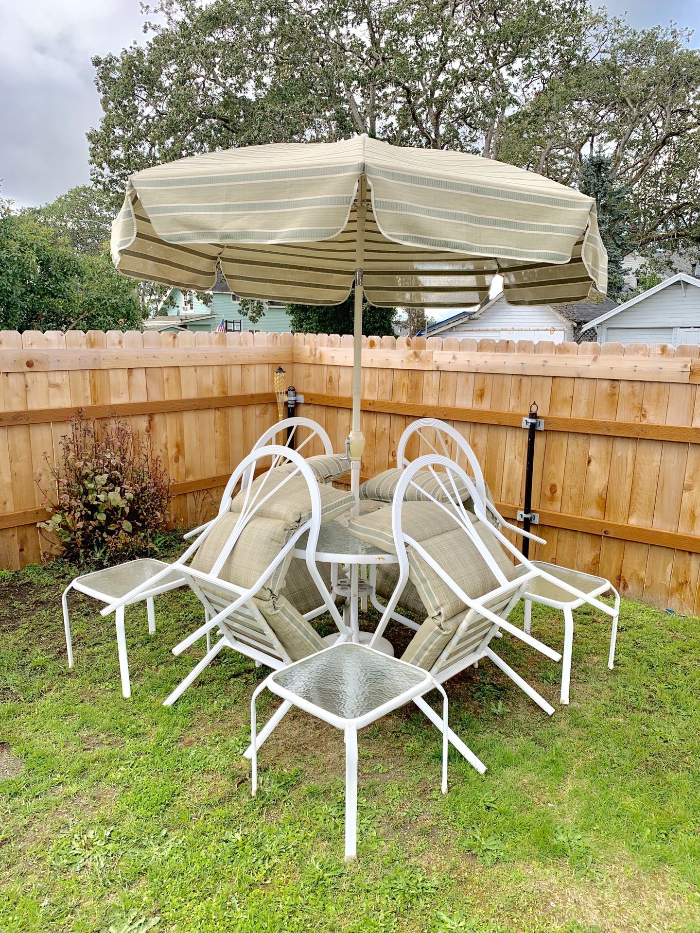 Outdoor Furniture: Table, Umbrella, 4 chairs, w/ 4 side tables.