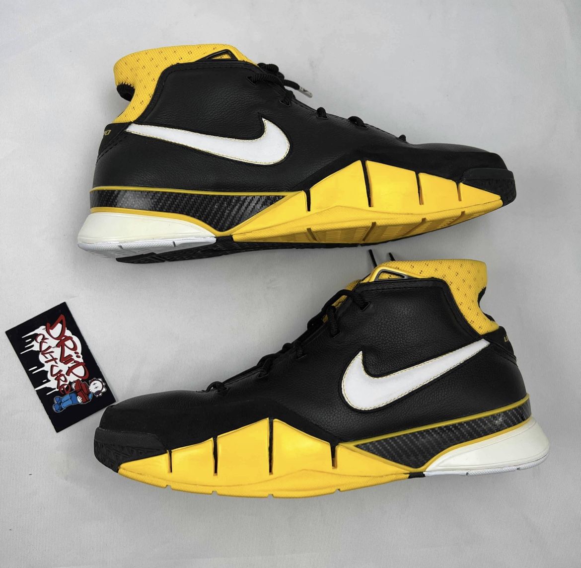 kobes shoes black and yellow