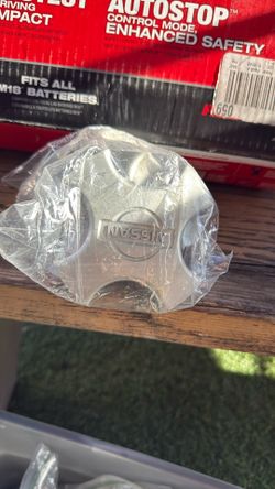 Nissan Center Caps 80 OBO
