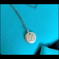 Tiffany’s “L” initial necklace 