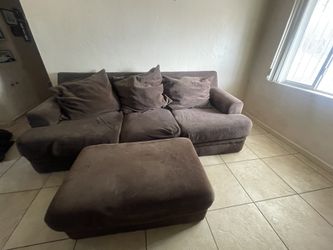 Couch and Pottery Barn TV stand .