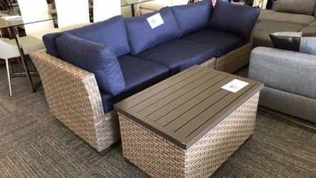 Outdoor set (2 corner, 1 center , 1 storage ottoman)-8’ 4” long