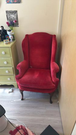 Antique high back red velvet chair