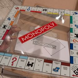 New Glass Monopoly board and game set never used no damage in box