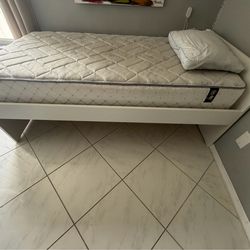 Twin bed with mattress