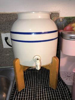 Ceramic dispenser with stand