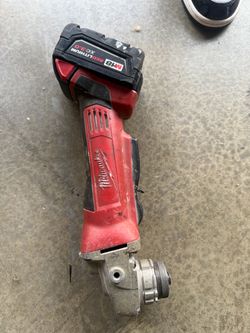 Milwaukee grinder and battery