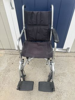 Transport Wheelchair.