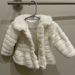 6-9 months faux fur and boots, new w/o tag