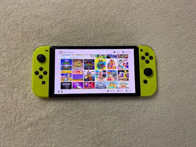 SWITCH OLED with 100 POPULAR GAMES