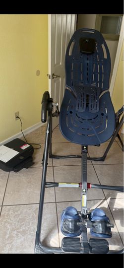 Teeter - back decompression