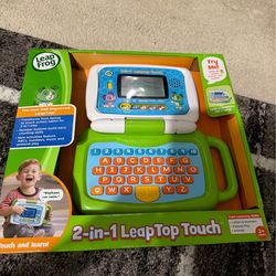 Brand New 2-in-1 LeapTop Touch  New activities ABC’s , numbers, music and pretend play