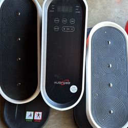 Under the desk bike and vibration plate 