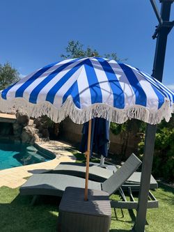 Blue and White Striped Beach Umbrella with Fringe
