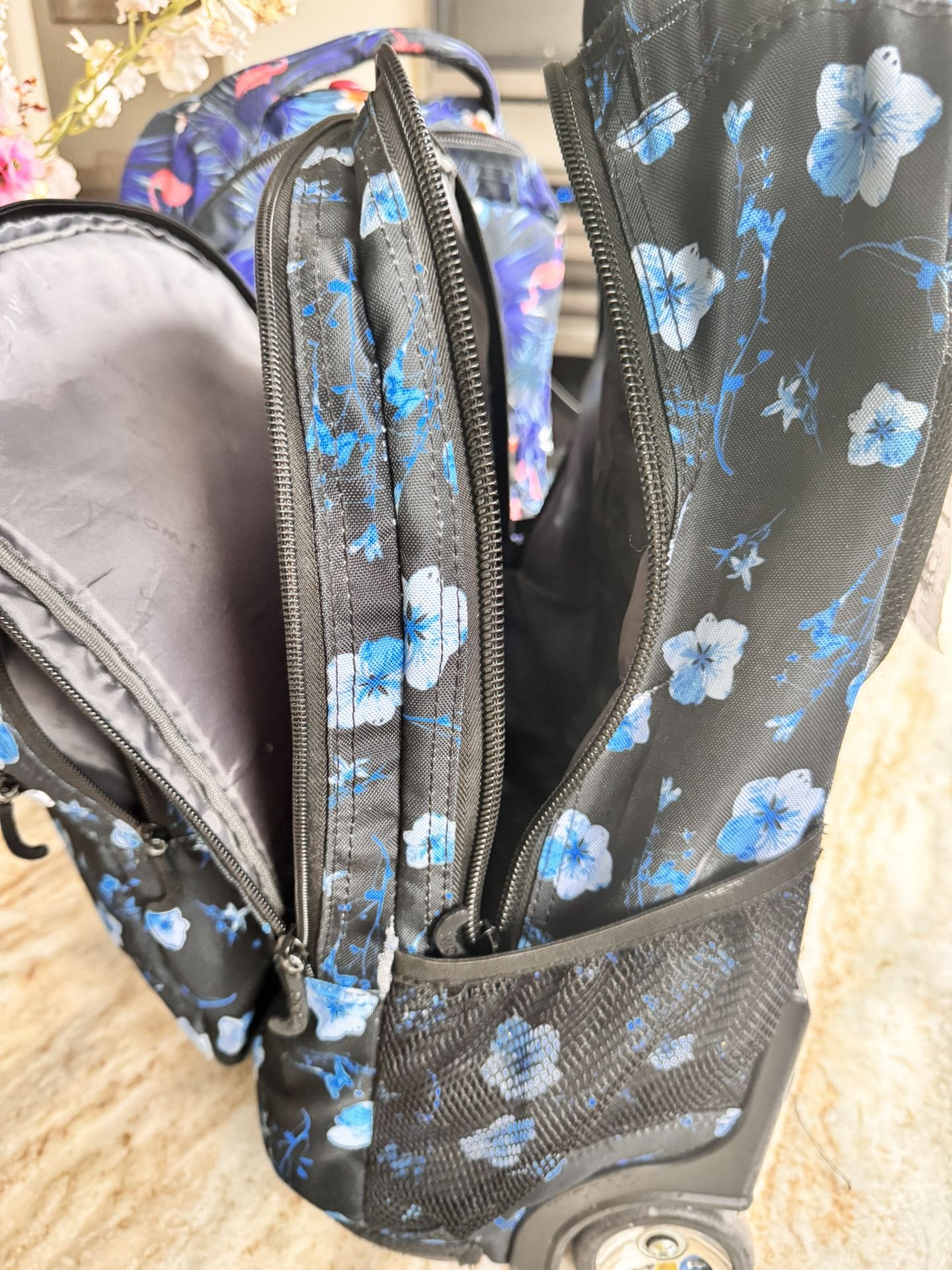 2 Backpacks With Wheels