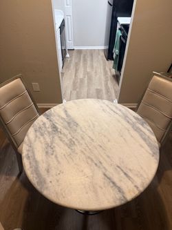 Round stone Dining table and chairs