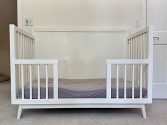 West Elm x Pottery Barn Kids Mid-Century 4-in-1 Convertible Crib (White) + Toddler Bed Conversion Kit — $425