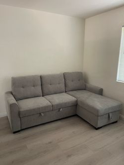 Compact Sofa with Pull Out Sleeper