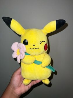 Pokemon Pikachu  holding flower plush toys