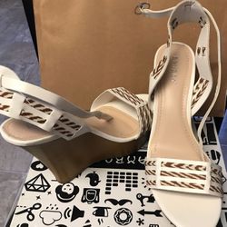 Woman’s Tan wedges size 10
