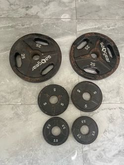 Cash only no Zelle pair of used 25lb 5lb and 2.5lb total 65lb Olympic weights plates total   Keyword gym pesas mancuernas gynasio dumbbells bike exerc