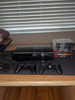 PS3 + 2 controller + games