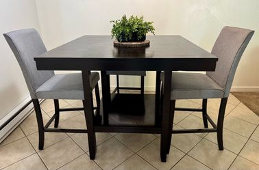 Bar height dining table