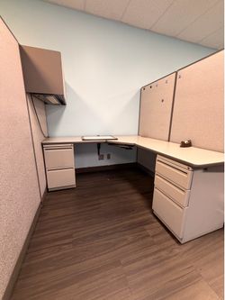 Office cubicles with desks